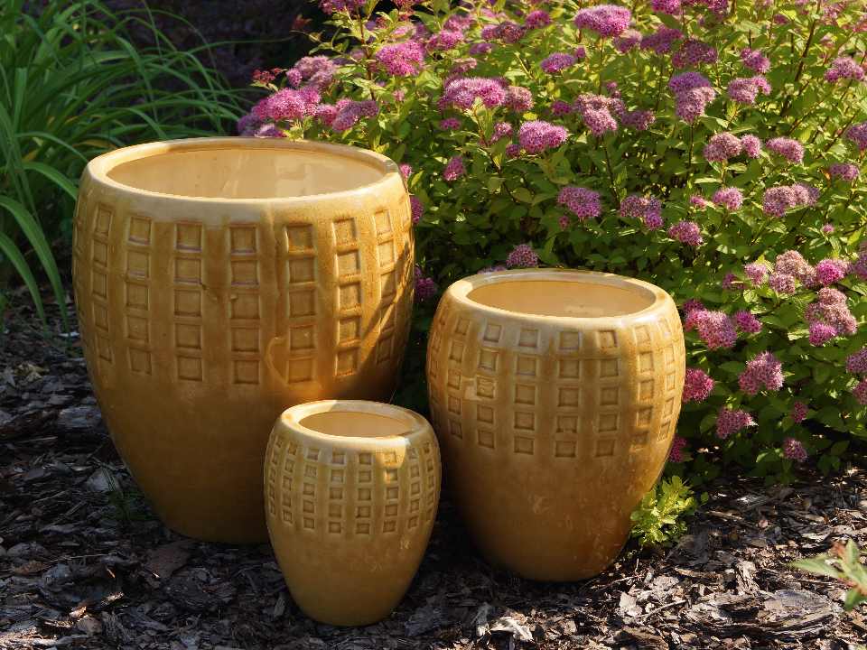 Glazed ceramic pots in honey color